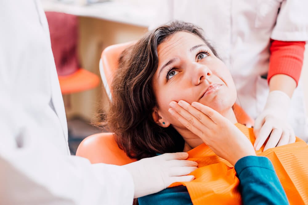 woman having tooth ache